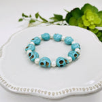 Turquoise Magnesite Skull bead Bracelet with Pearl Accent