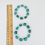 Turquoise Magnesite Skull bead Bracelet with Pearl Accent