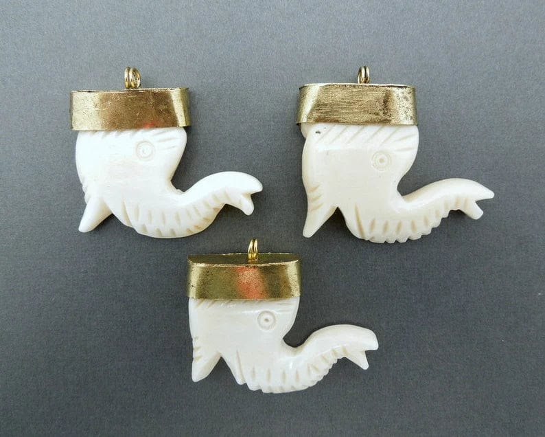 Elephant carved bone pendant